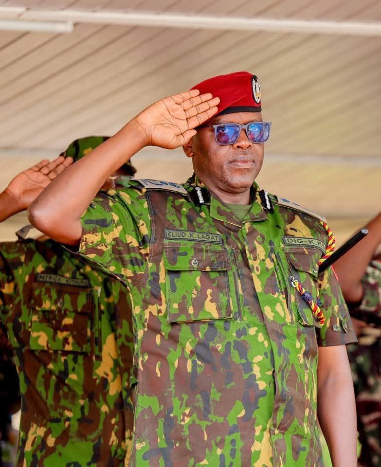 photo of Deputy Inspector General Eliud Langat saluting