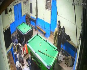 Photo of police officers beating youths playing pool