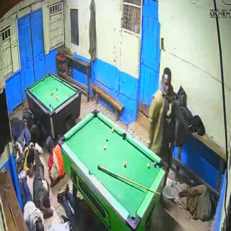 Photo of police officers beating youths playing pool