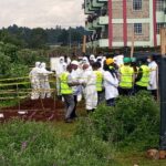 Detectives from the Directorate of criminal investigations homicide department begin exhumation of bodies discovered burried in a mass grave in Kericho
