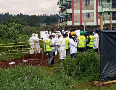 Detectives from the Directorate of criminal investigations homicide department begin exhumation of bodies discovered burried in a mass grave in Kericho